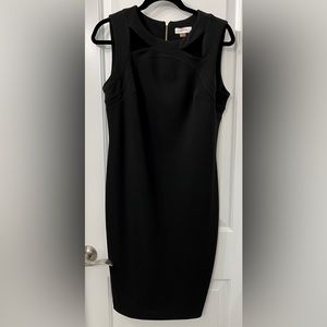 Calvin Klein body-con dress in black; Size 10.